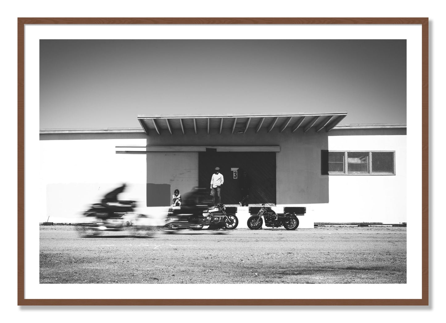 Framed photograph of Treasure Island Racing by Dylan Ozanich, Walnut frame, Borders