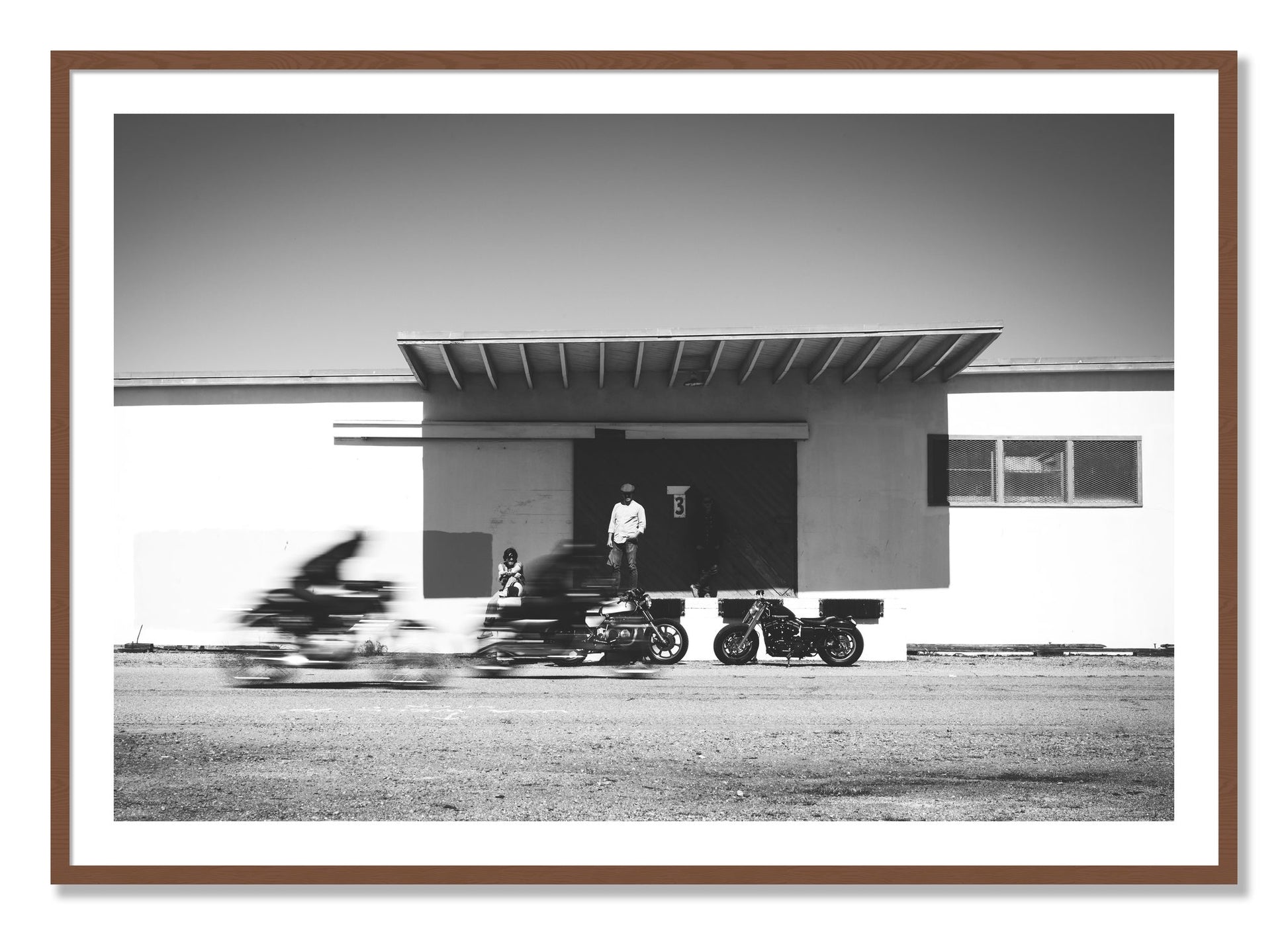 Framed photograph of Treasure Island Racing by Dylan Ozanich, Walnut frame, Borders