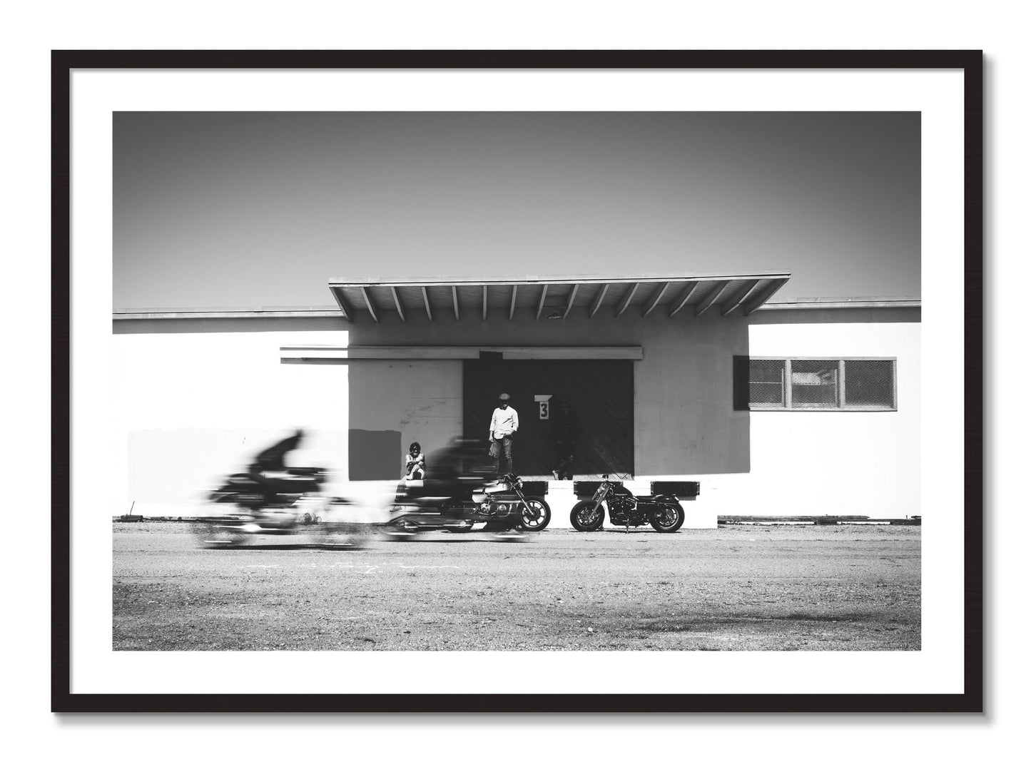 Framed photograph of Treasure Island Racing by Dylan Ozanich, Black Walnut frame, Borders