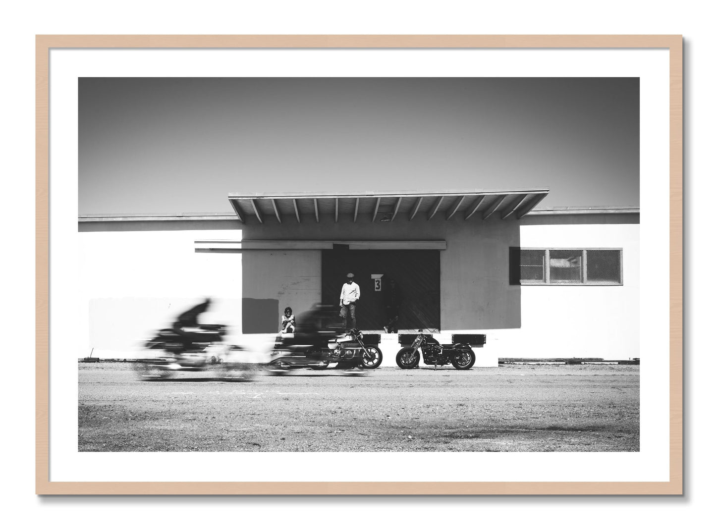 Framed photograph of Treasure Island Racing by Dylan Ozanich, Maple frame, Borders