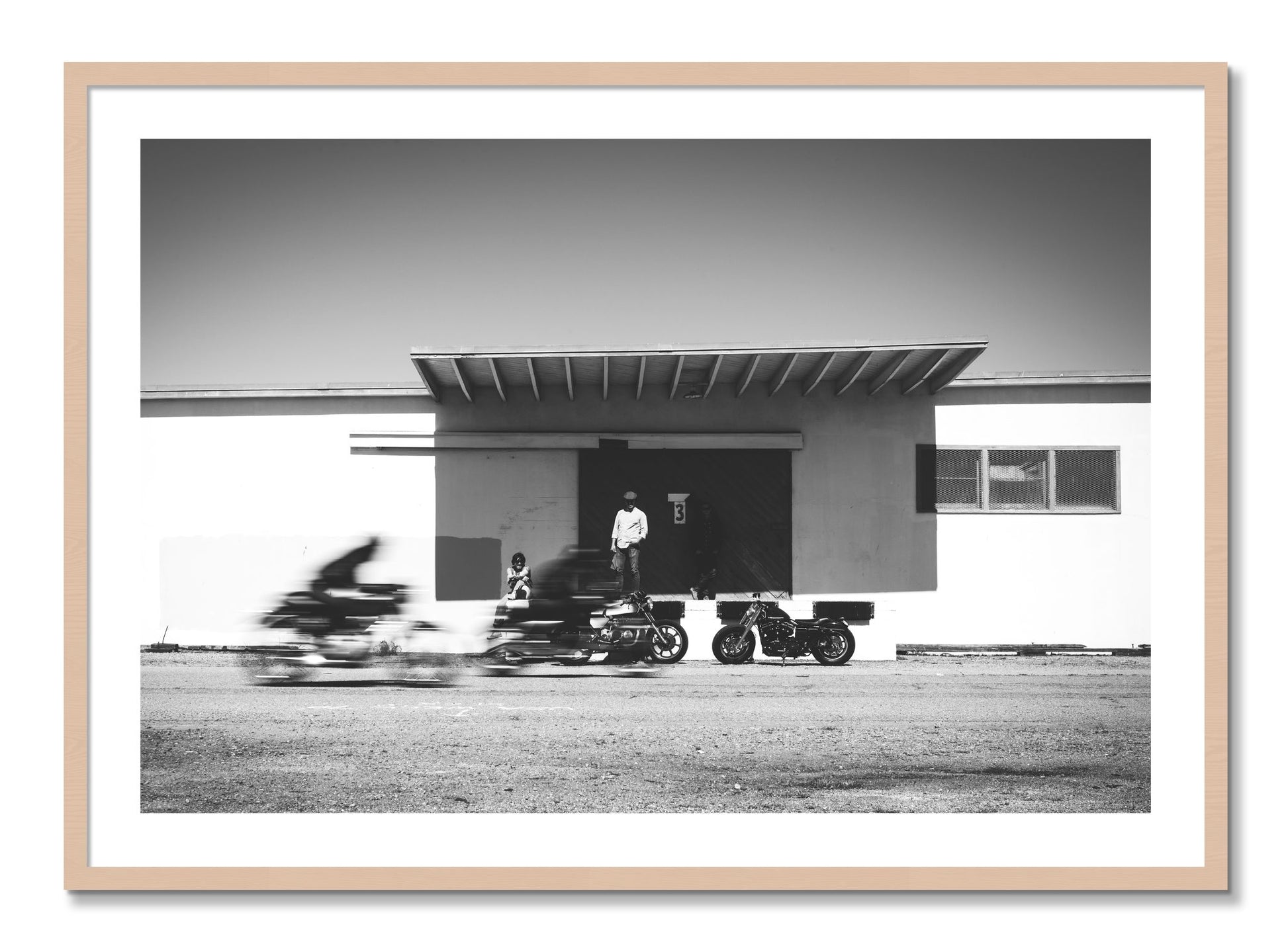 Framed photograph of Treasure Island Racing by Dylan Ozanich, Maple frame, Borders