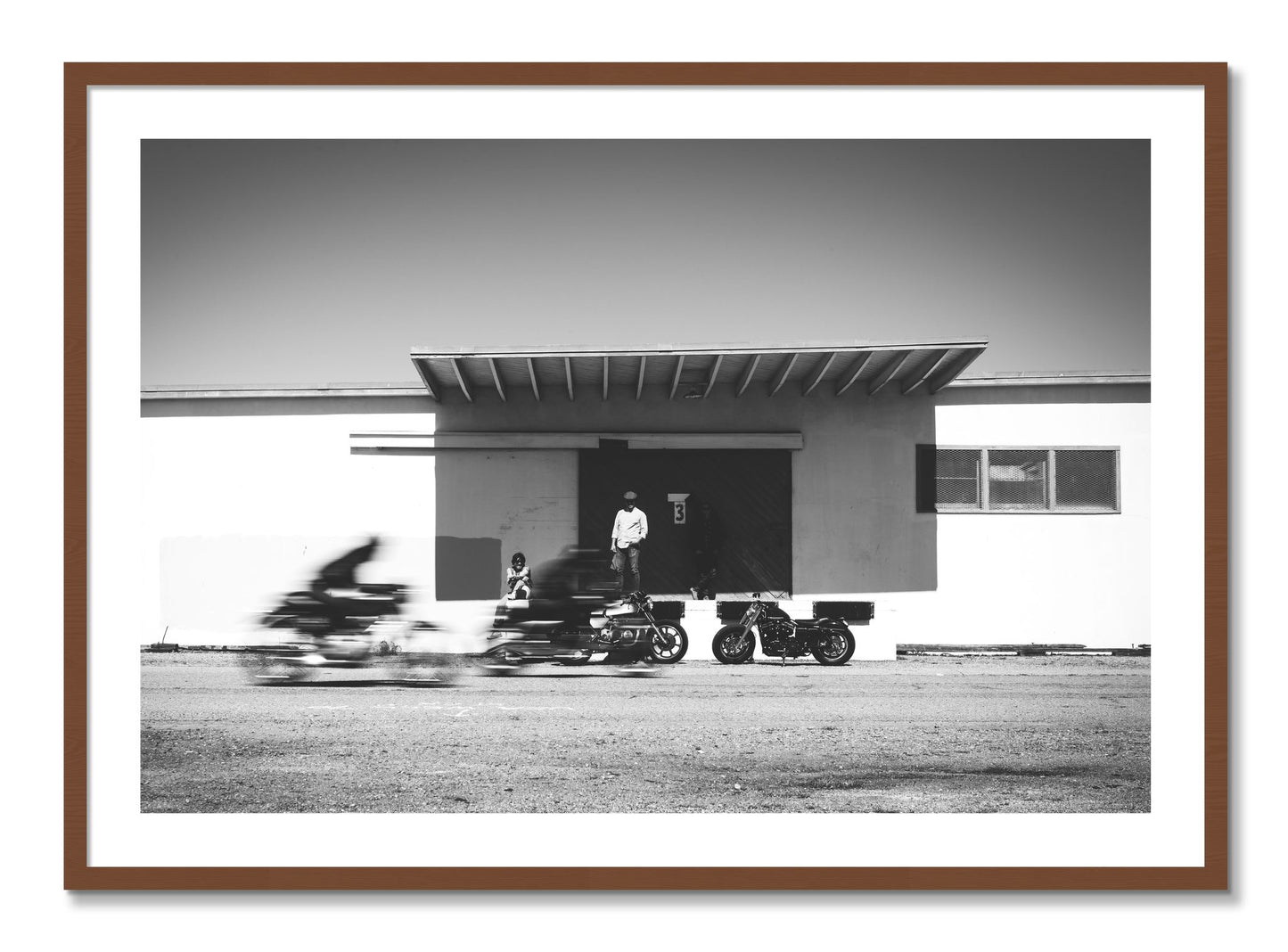 Framed photograph of Treasure Island Racing by Dylan Ozanich, Walnut frame, Borders
