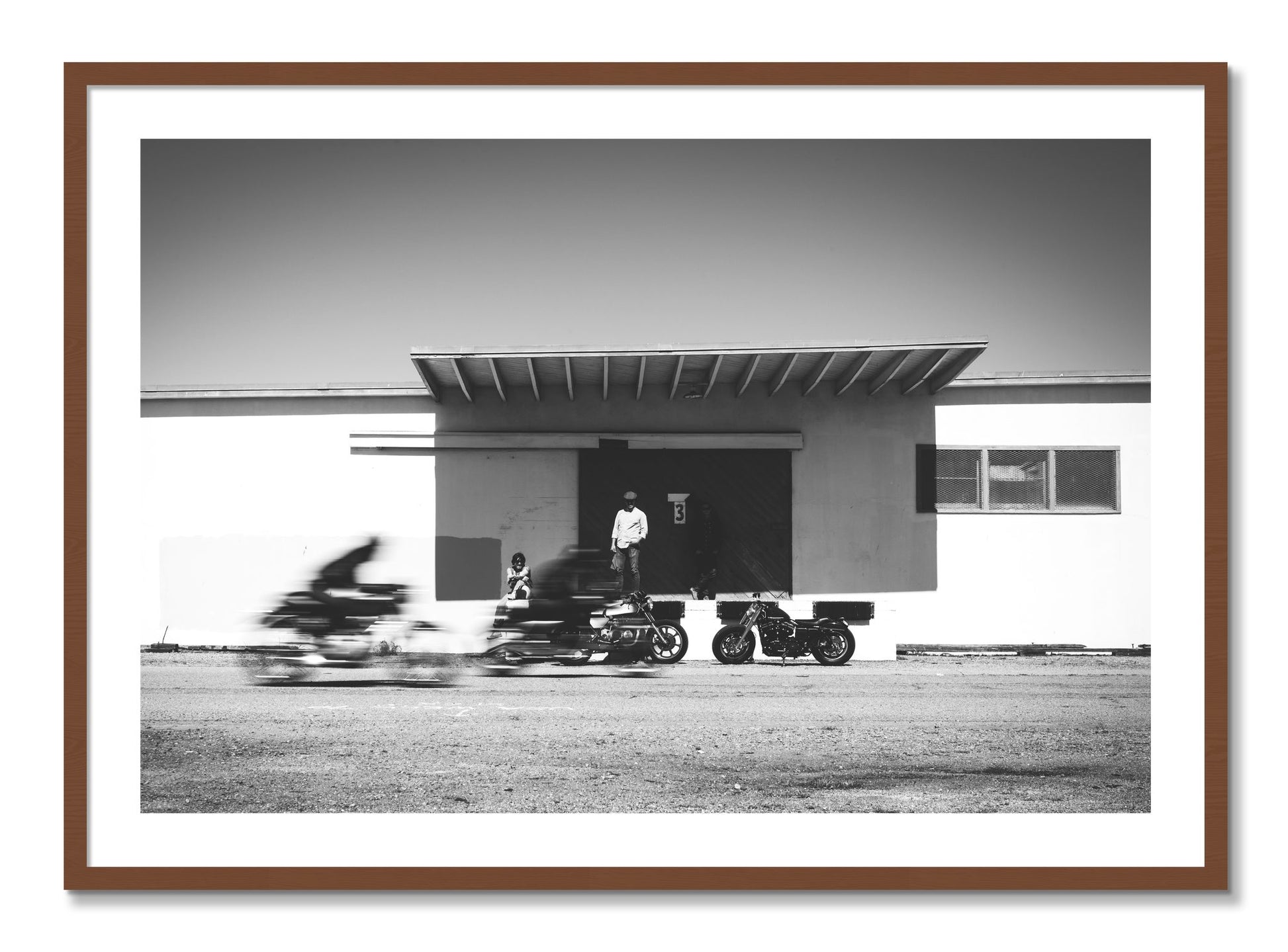 Framed photograph of Treasure Island Racing by Dylan Ozanich, Walnut frame, Borders