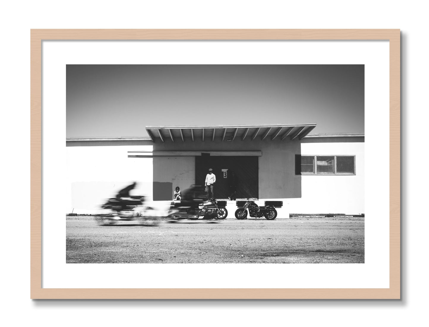 Framed photograph of Treasure Island Racing by Dylan Ozanich, Maple frame, Borders