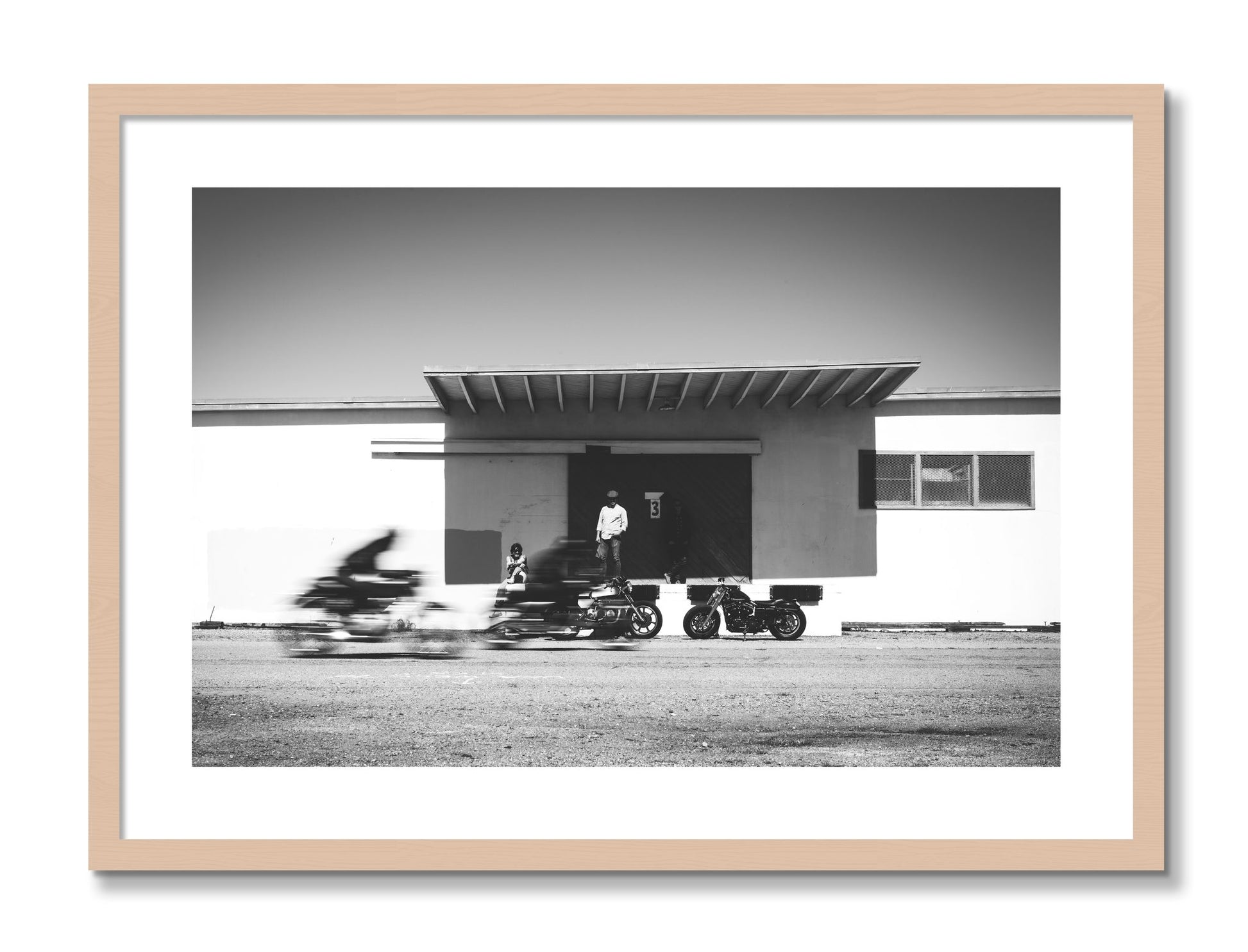 Framed photograph of Treasure Island Racing by Dylan Ozanich, Maple frame, Borders