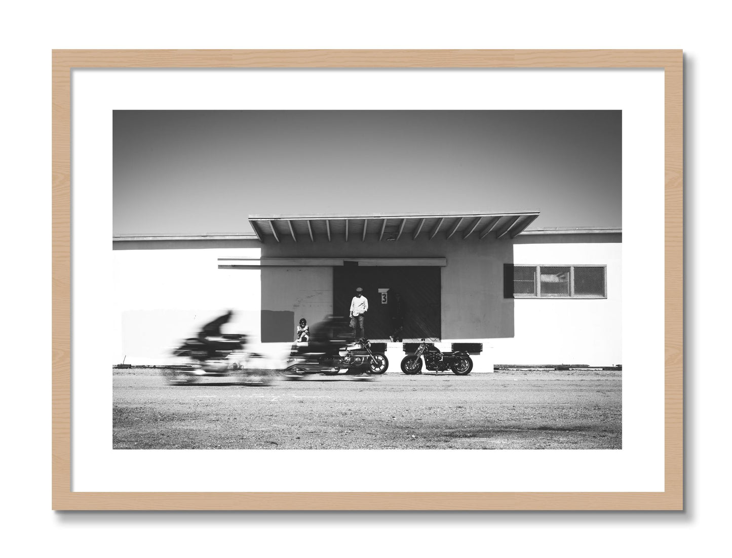 Framed photograph of Treasure Island Racing by Dylan Ozanich, Oak frame, Borders
