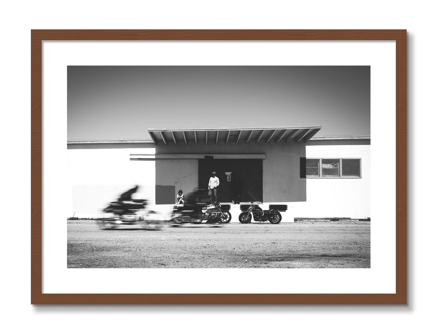 Framed photograph of Treasure Island Racing by Dylan Ozanich, Walnut frame, Borders