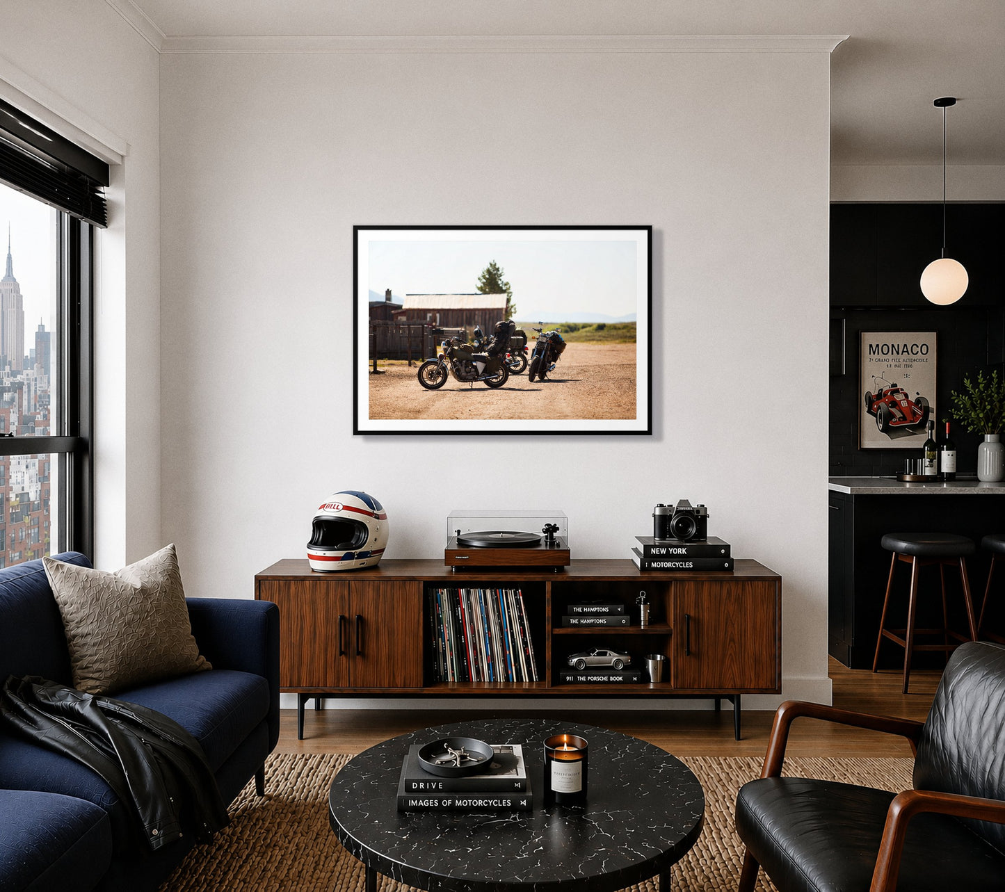Two Gallons by Dylan Ozanich in a Black frame, above a record console in a city apartment with a turntable and vintage helmet