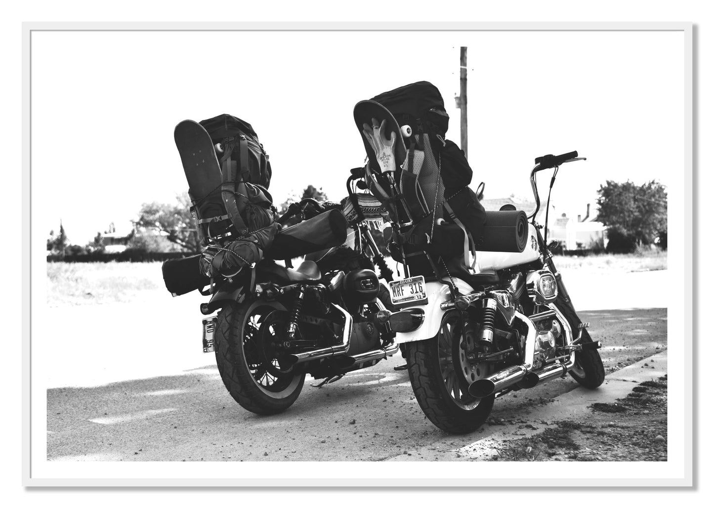 Two Wheels Four Wheels by Dylan Ozanich, 48×72 print with a White Border in a White frame