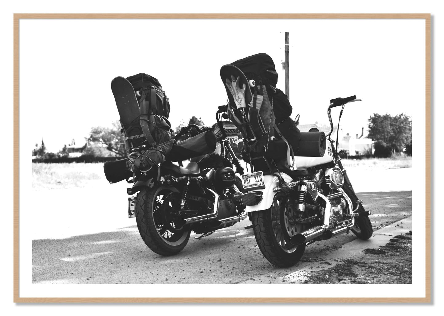 Framed photograph of Two Wheels Four Wheels by Dylan Ozanich, Oak frame, Borders