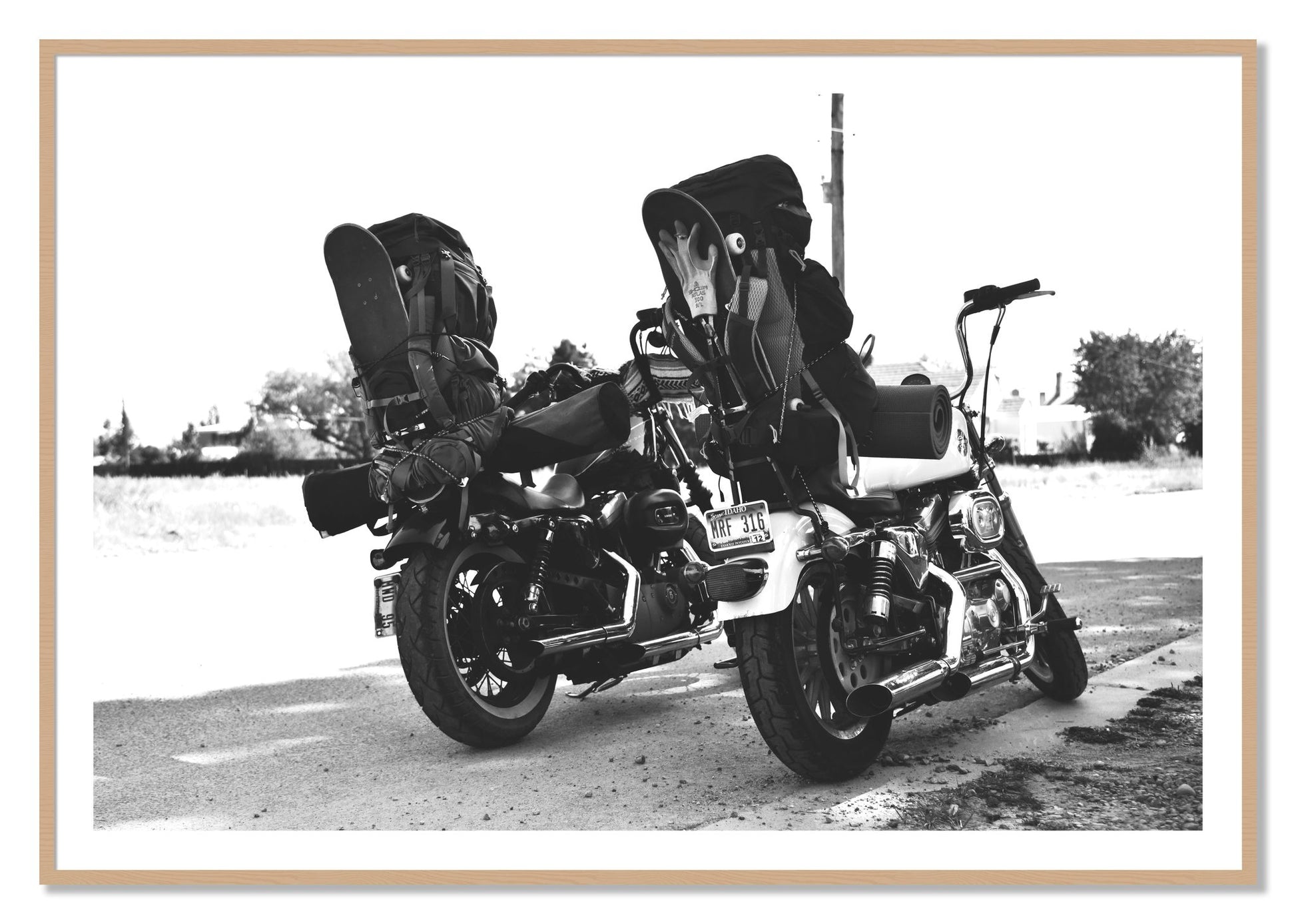 Framed photograph of Two Wheels Four Wheels by Dylan Ozanich, Oak frame, Borders