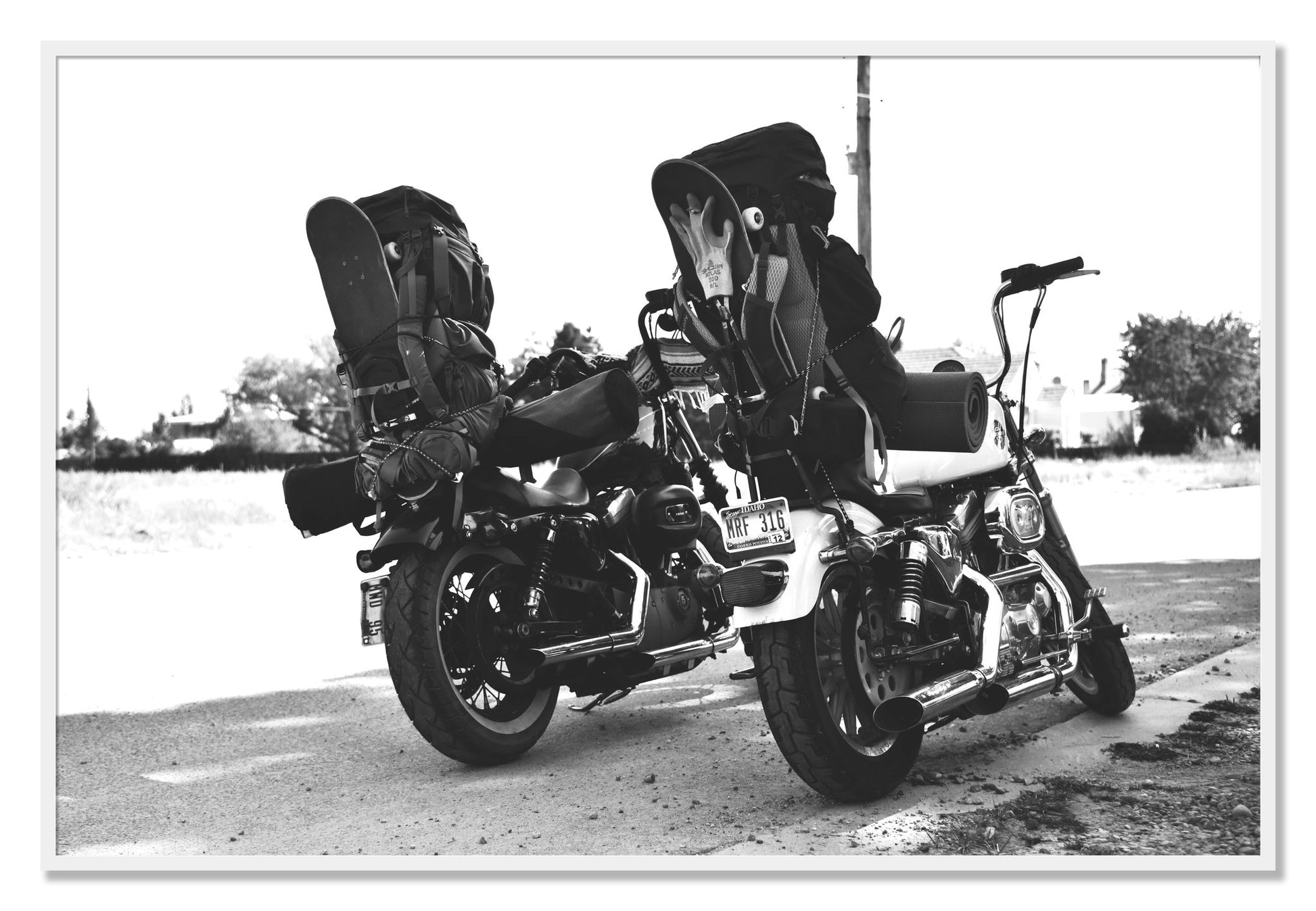 Framed photograph of Two Wheels Four Wheels by Dylan Ozanich, White frame, Full Bleed