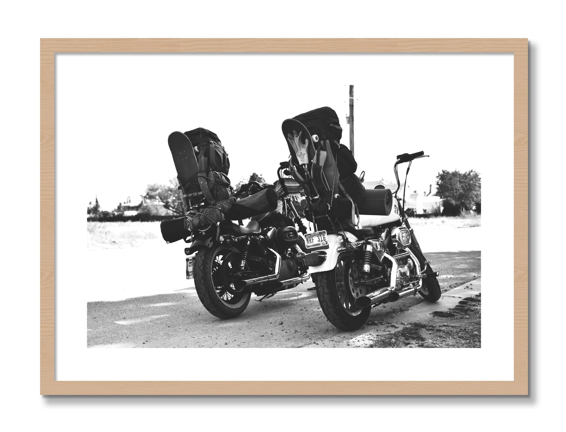 Framed photograph of Two Wheels Four Wheels by Dylan Ozanich, Oak frame, Borders