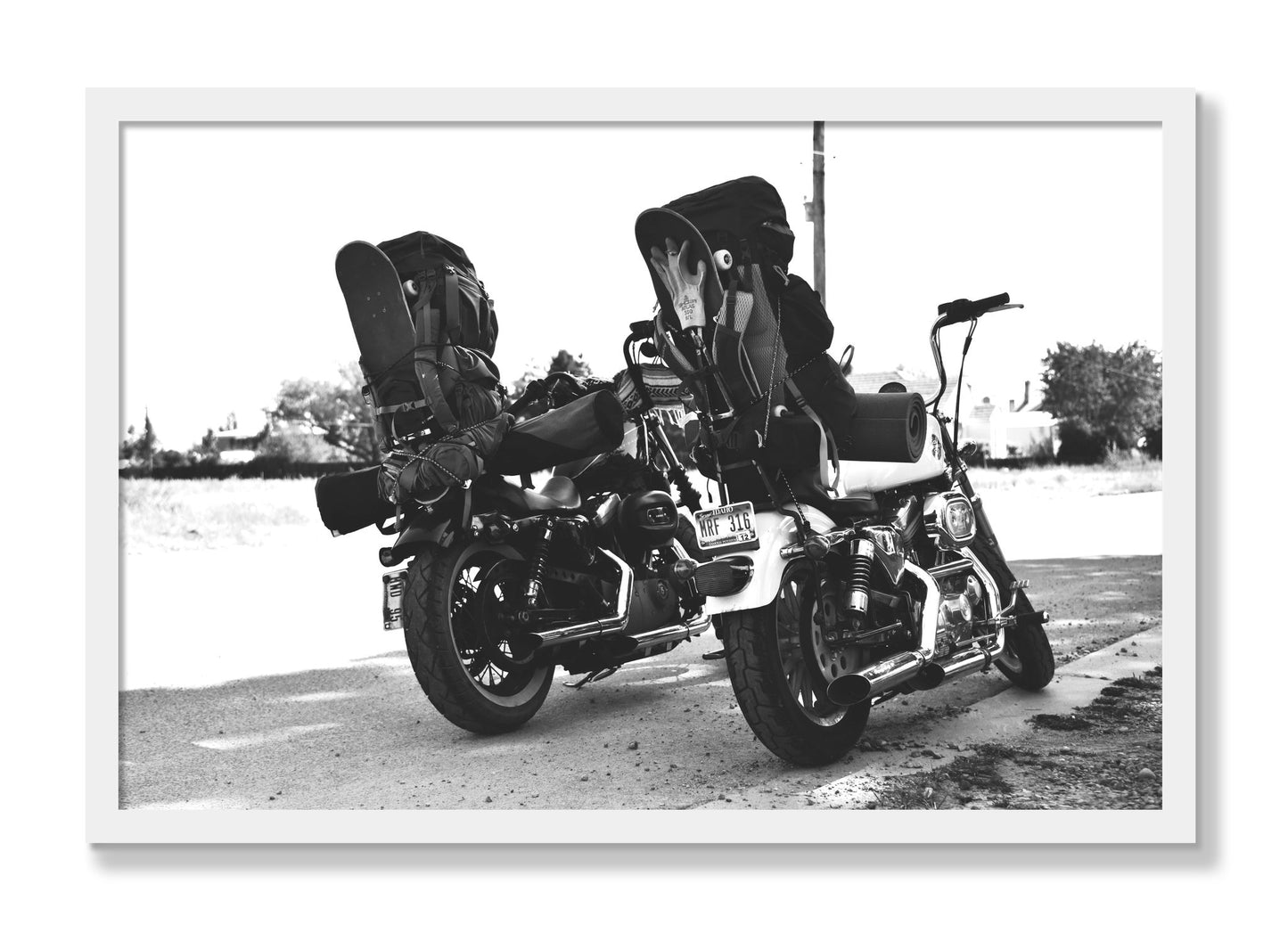 Framed photograph of Two Wheels Four Wheels by Dylan Ozanich, White frame, Full Bleed