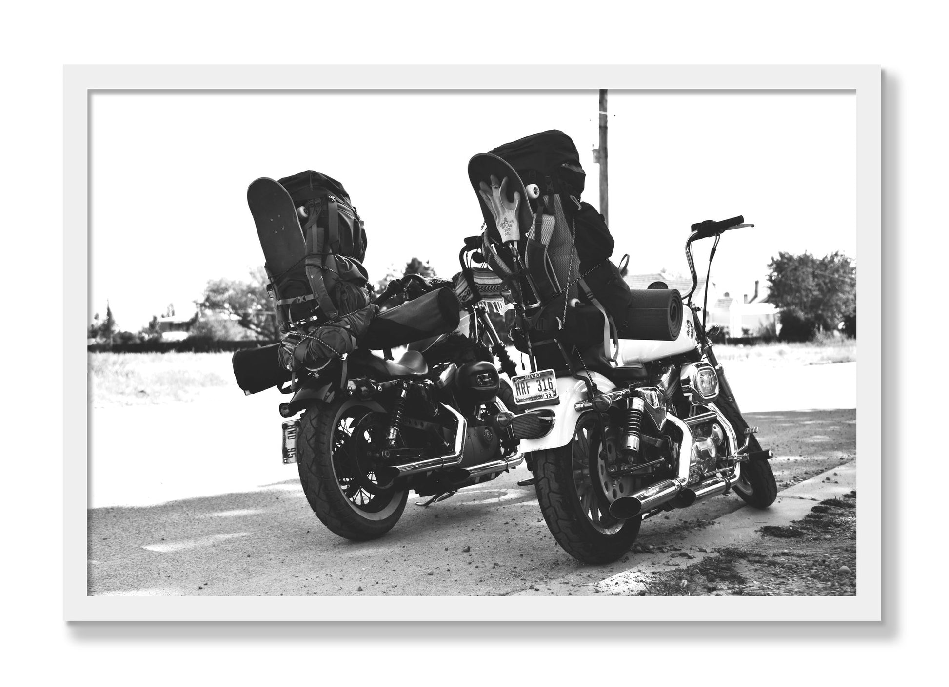 Framed photograph of Two Wheels Four Wheels by Dylan Ozanich, White frame, Full Bleed