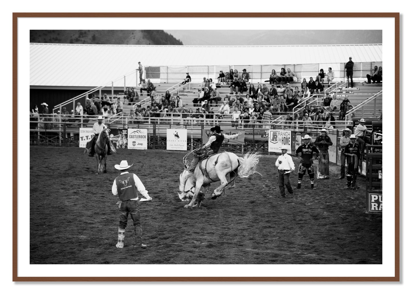 Framed photograph of United States Rodeo by Dylan Ozanich, Walnut frame, Borders
