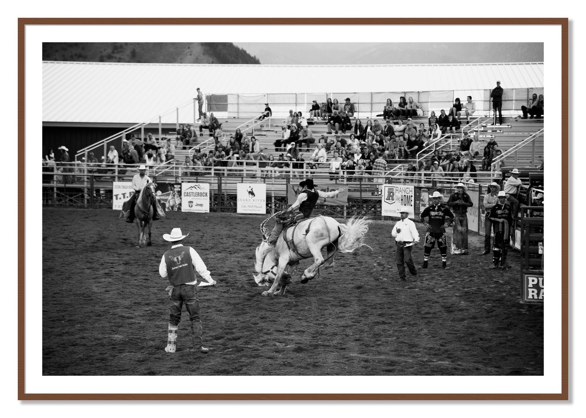 Framed photograph of United States Rodeo by Dylan Ozanich, Walnut frame, Borders
