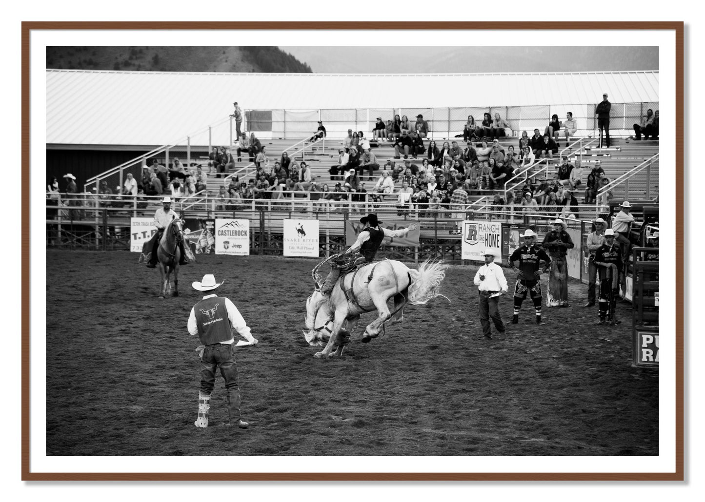 Framed photograph of United States Rodeo by Dylan Ozanich, Walnut frame, Borders
