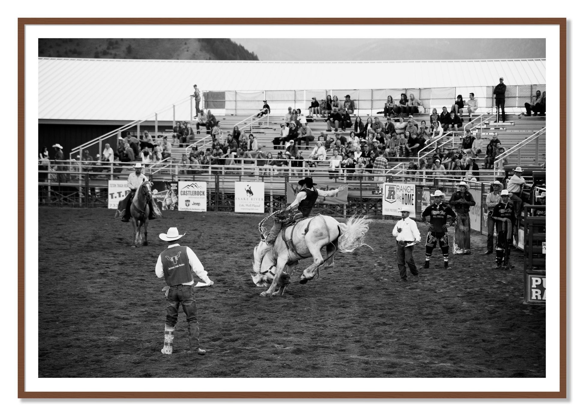 Framed photograph of United States Rodeo by Dylan Ozanich, Walnut frame, Borders
