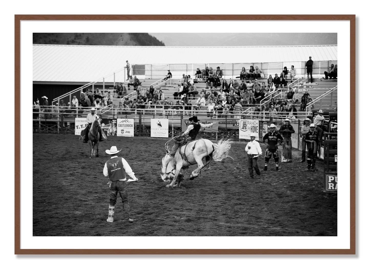 Framed photograph of United States Rodeo by Dylan Ozanich, Walnut frame, Borders
