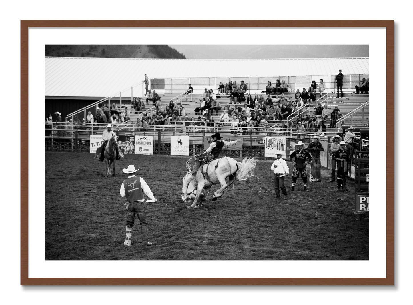 Framed photograph of United States Rodeo by Dylan Ozanich, Walnut frame, Borders
