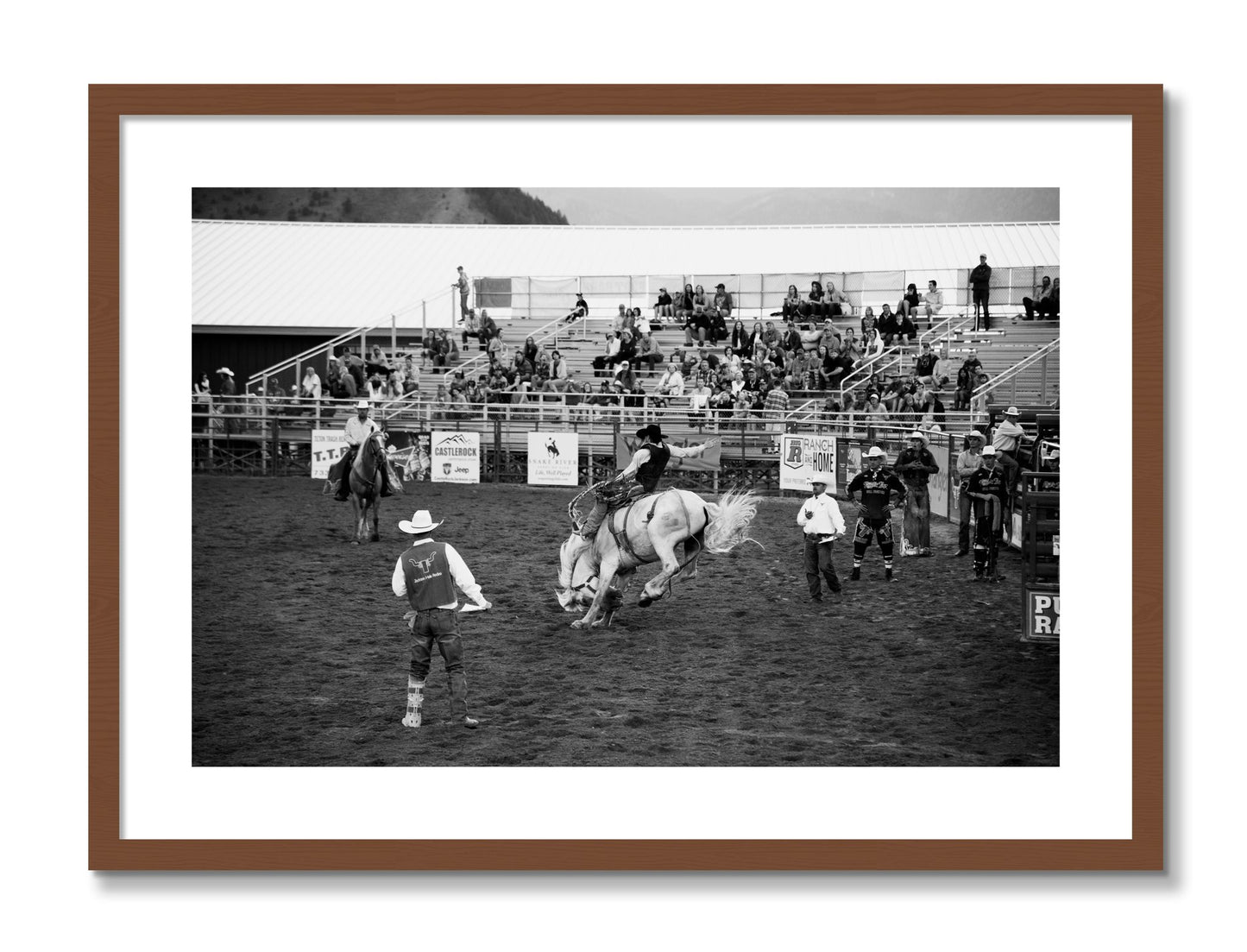 Framed photograph of United States Rodeo by Dylan Ozanich, Walnut frame, Borders