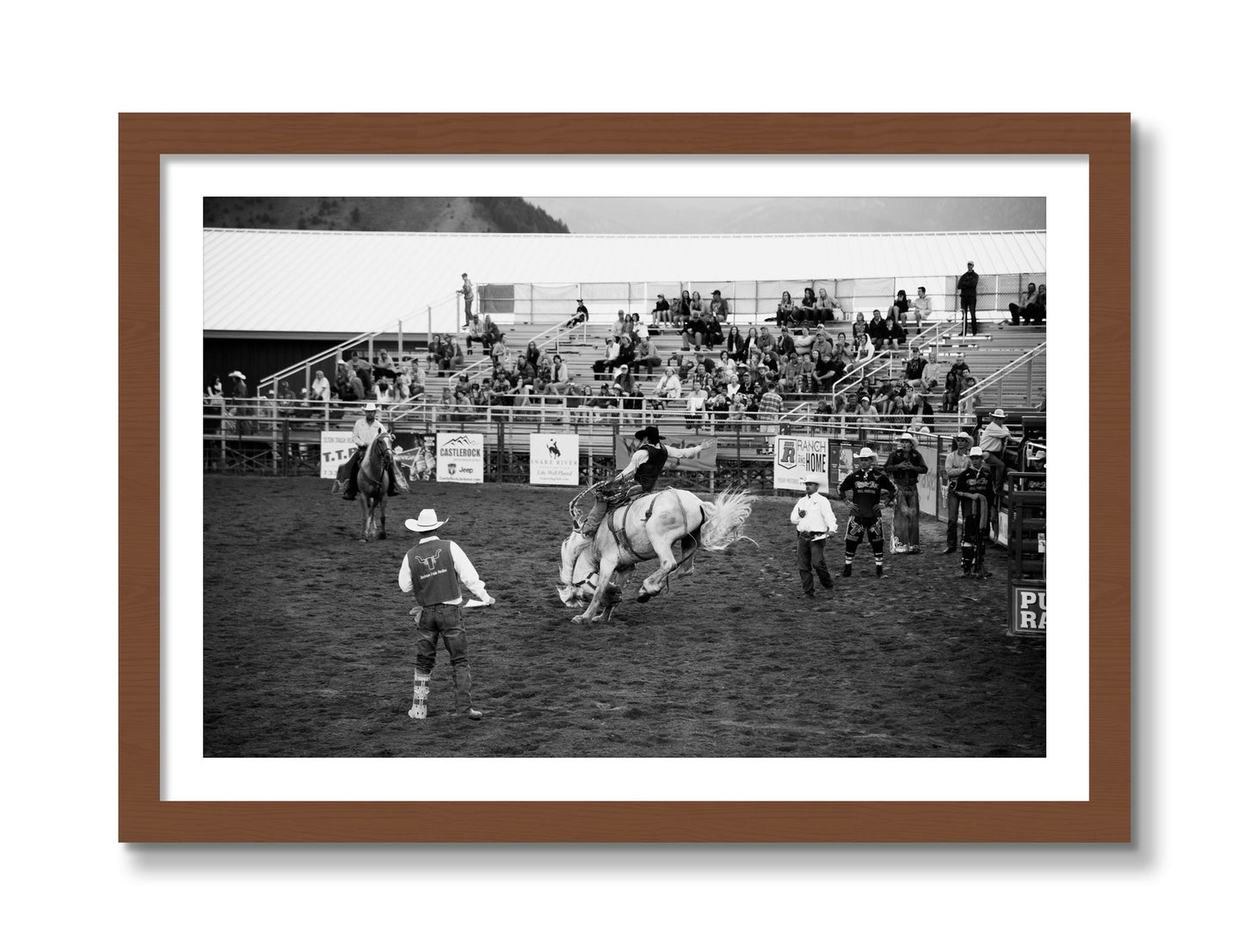 Framed photograph of United States Rodeo by Dylan Ozanich, Walnut frame, Borders