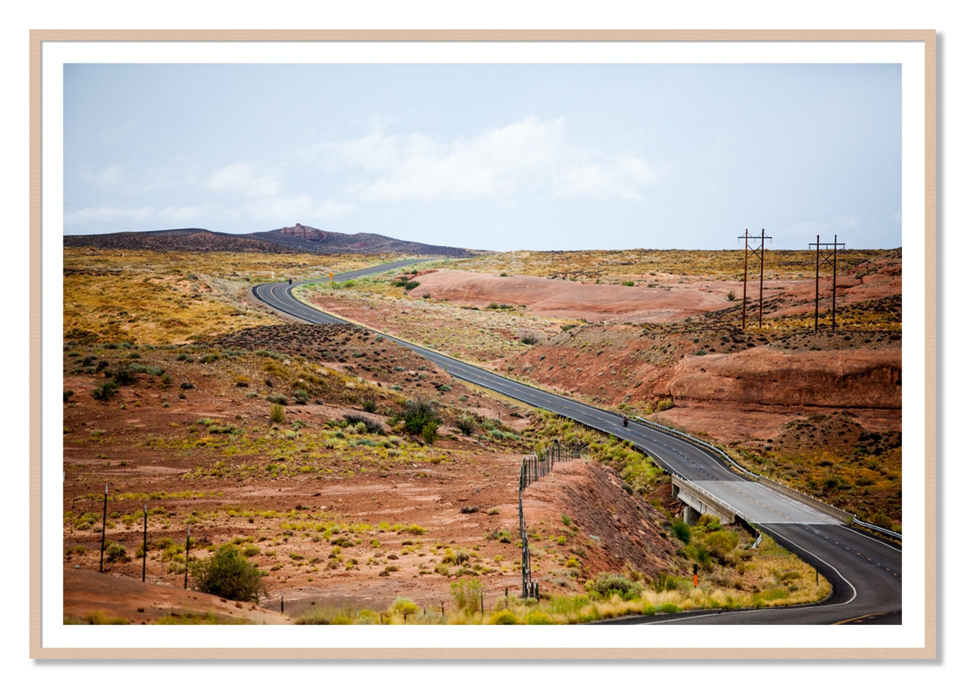 We Rode by Dylan Ozanich, 48×72 print with a White Border in a Maple frame