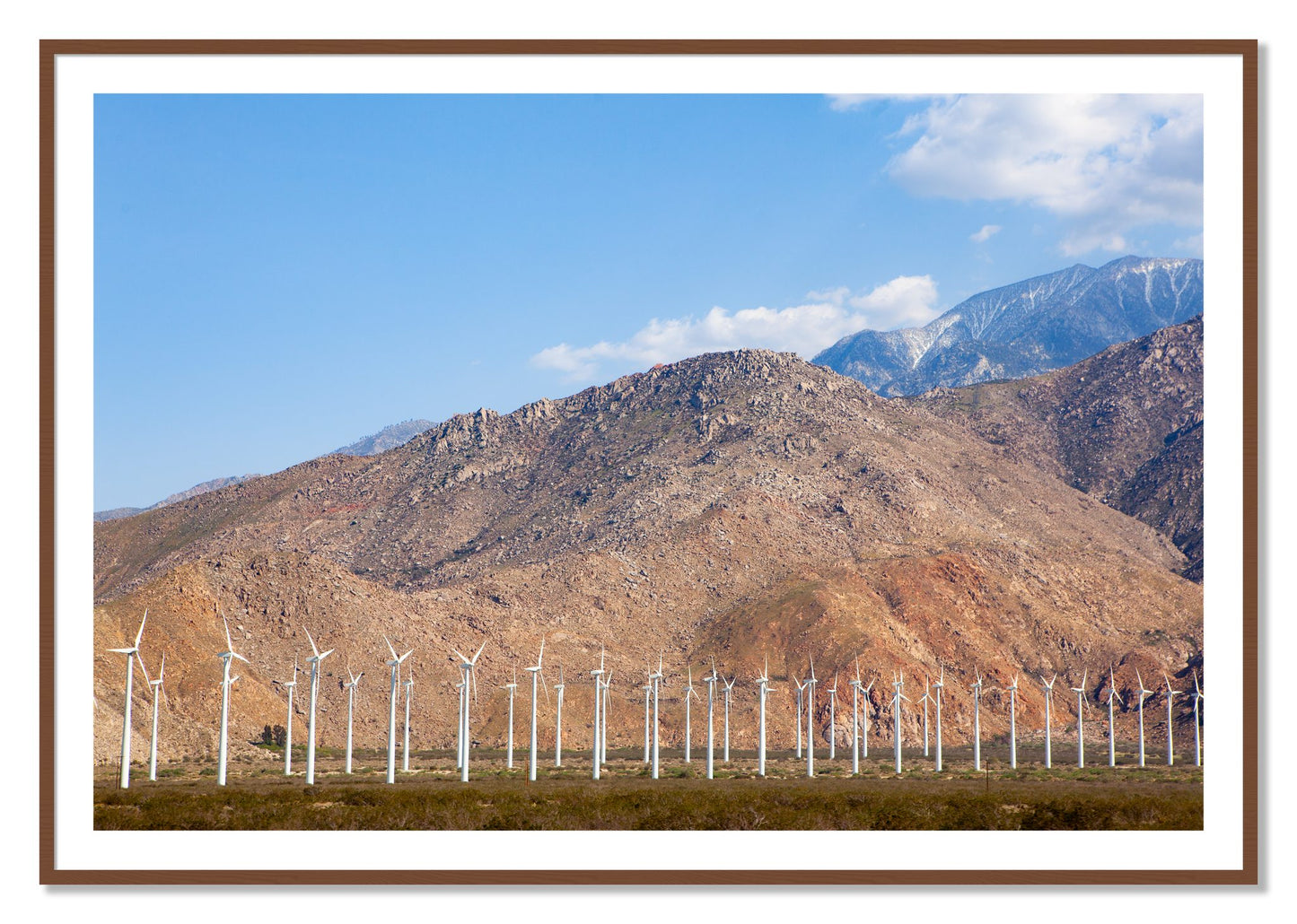 Framed photograph of Wind by Dylan Ozanich, Walnut frame, Borders
