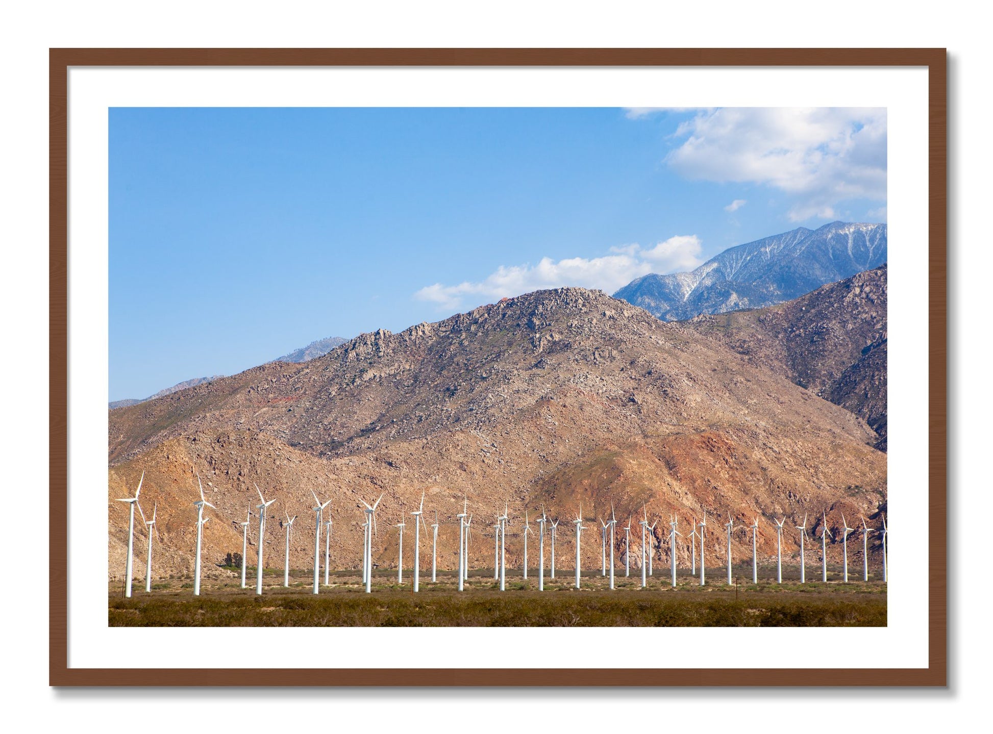 Framed photograph of Wind by Dylan Ozanich, Walnut frame, Borders