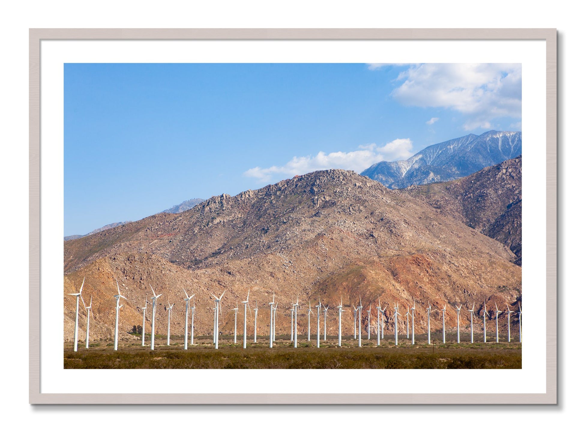Framed photograph of Wind by Dylan Ozanich, White Maple frame, Borders