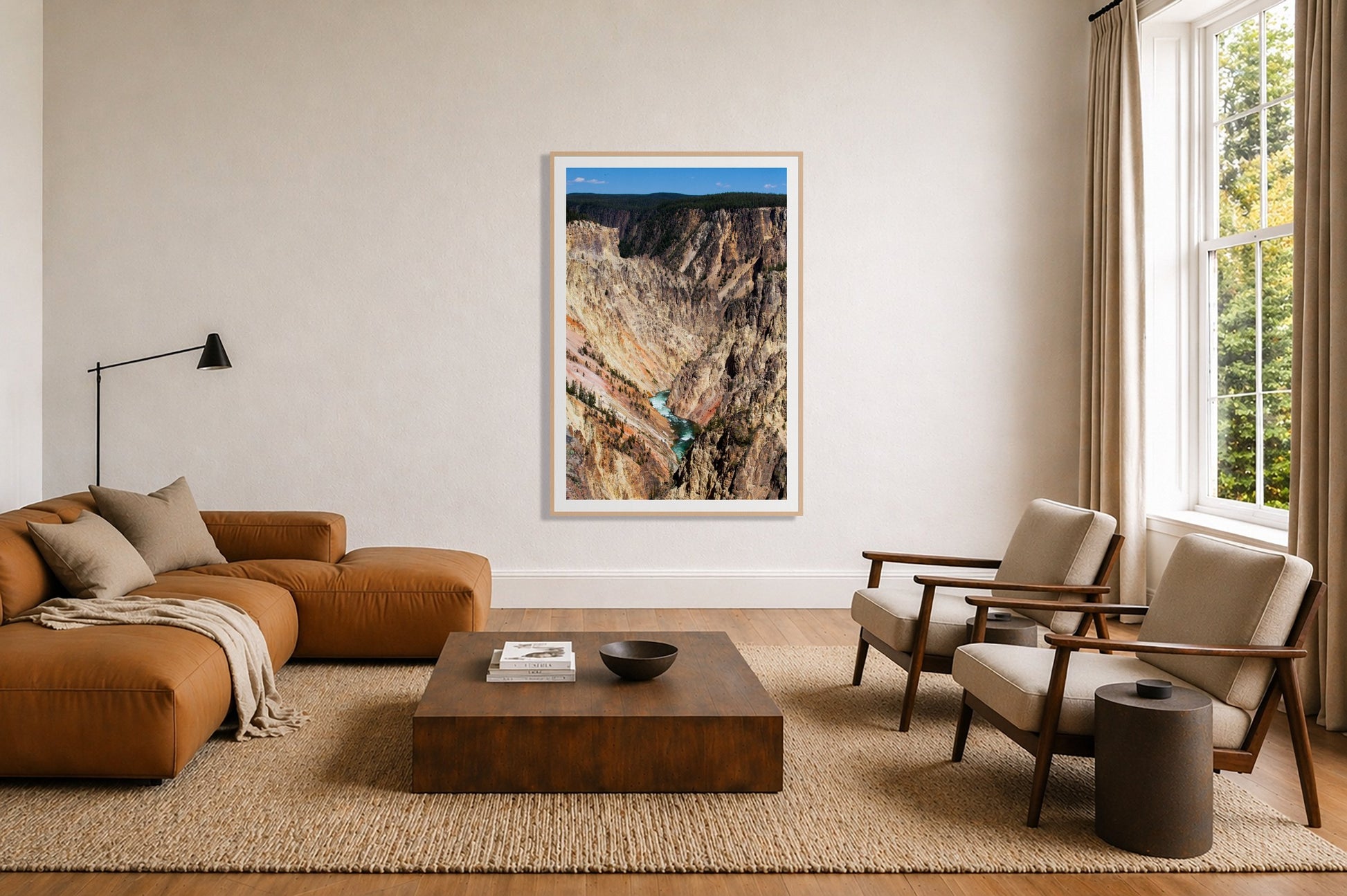 Framed photograph of Yellowstone Canyon by Dylan Ozanich displayed on a wall