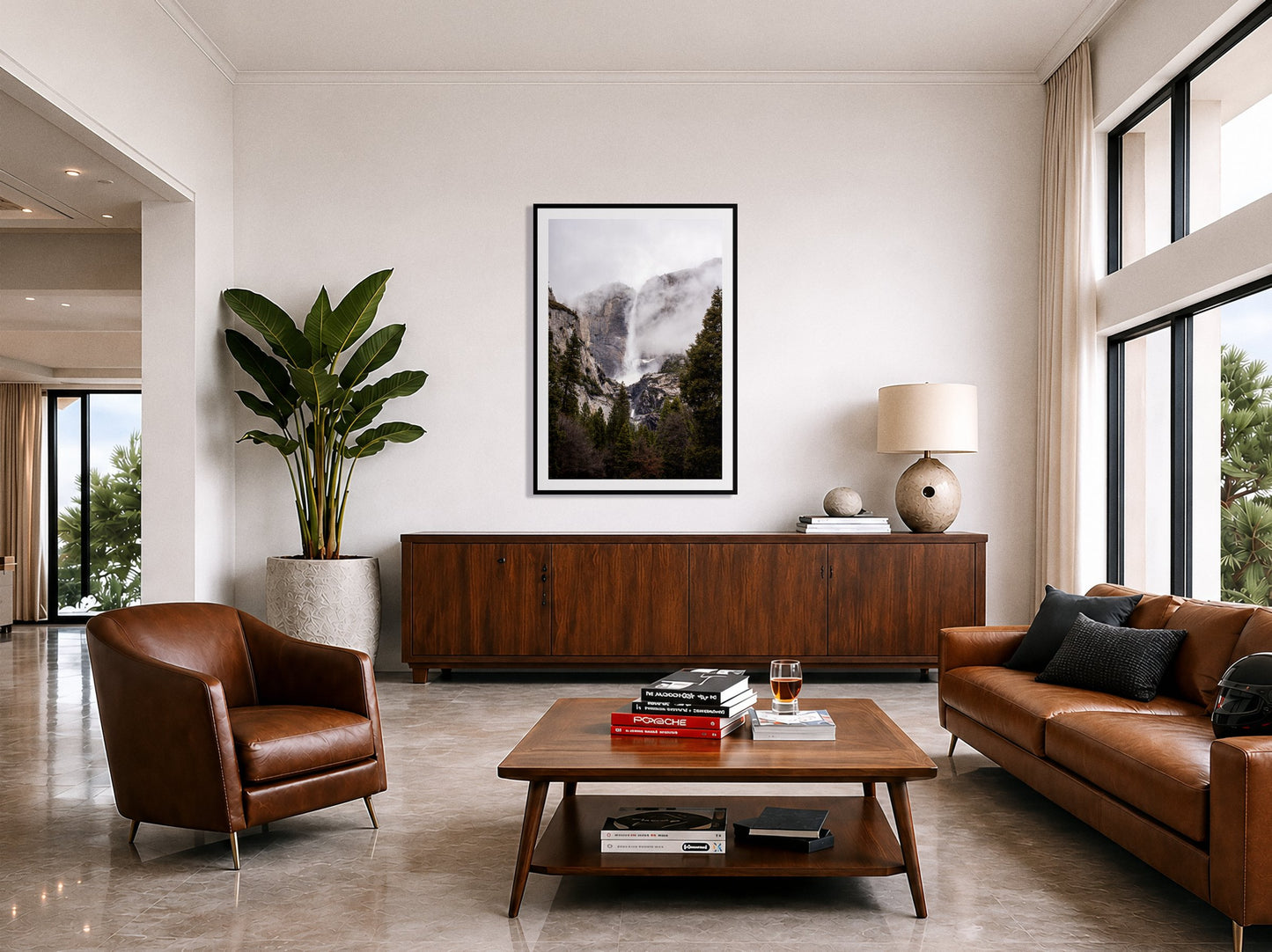 Framed photograph of Yosemite Falls by Dylan Ozanich displayed on a wall
