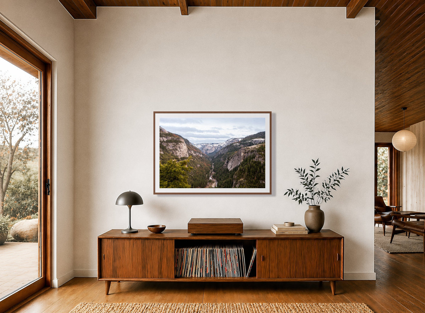 Framed photograph of Yosemite Valley by Dylan Ozanich displayed on a wall