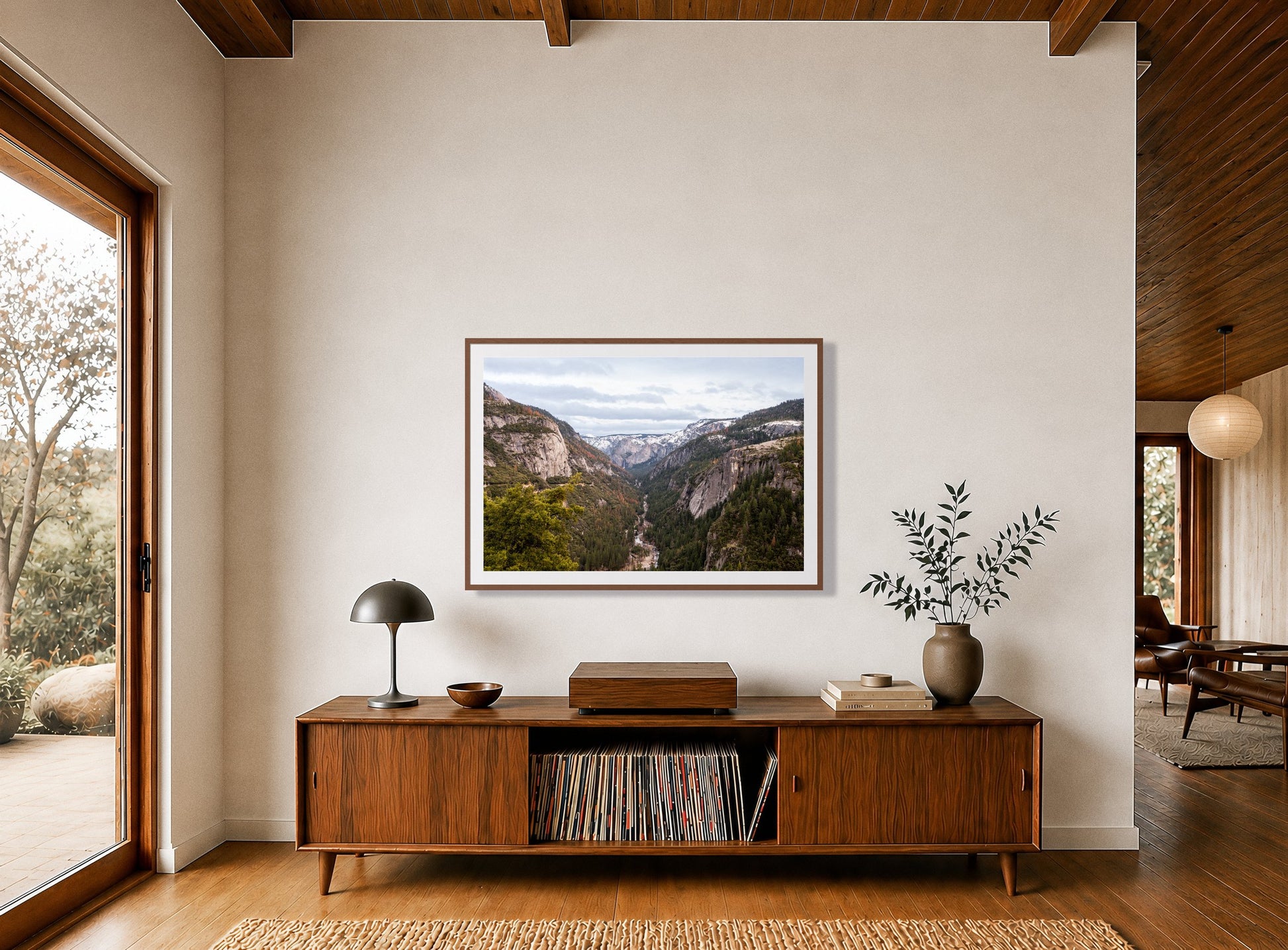 Framed photograph of Yosemite Valley by Dylan Ozanich displayed on a wall