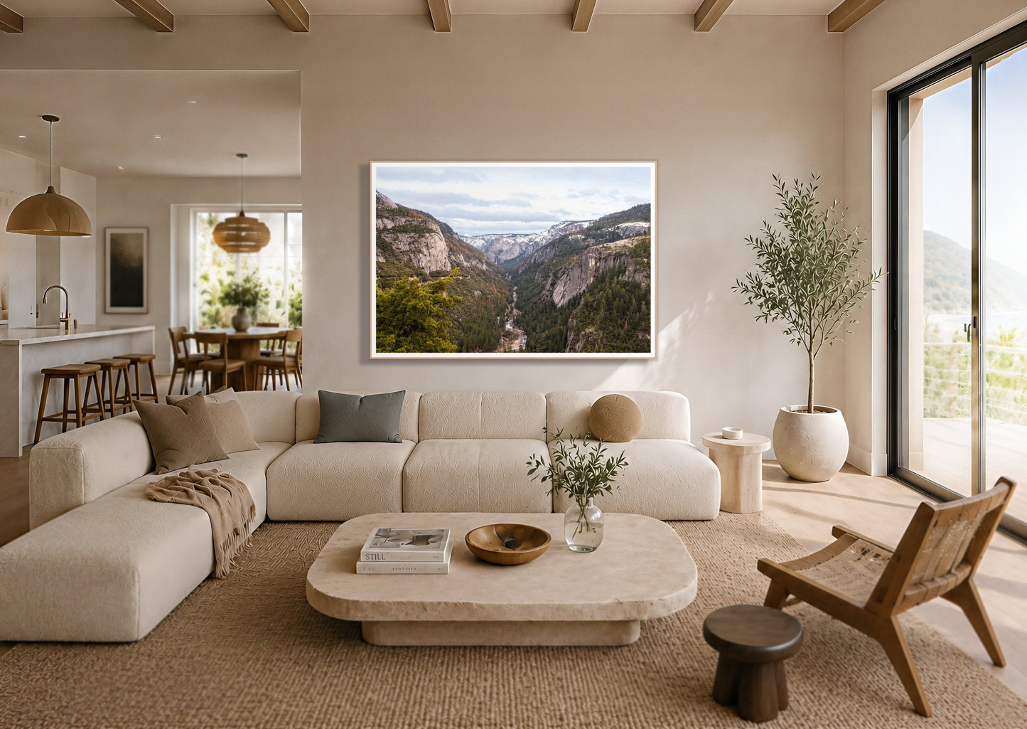 Yosemite Valley by Dylan Ozanich in an Oak frame, above a cream sectional in a coastal living room with an ocean view