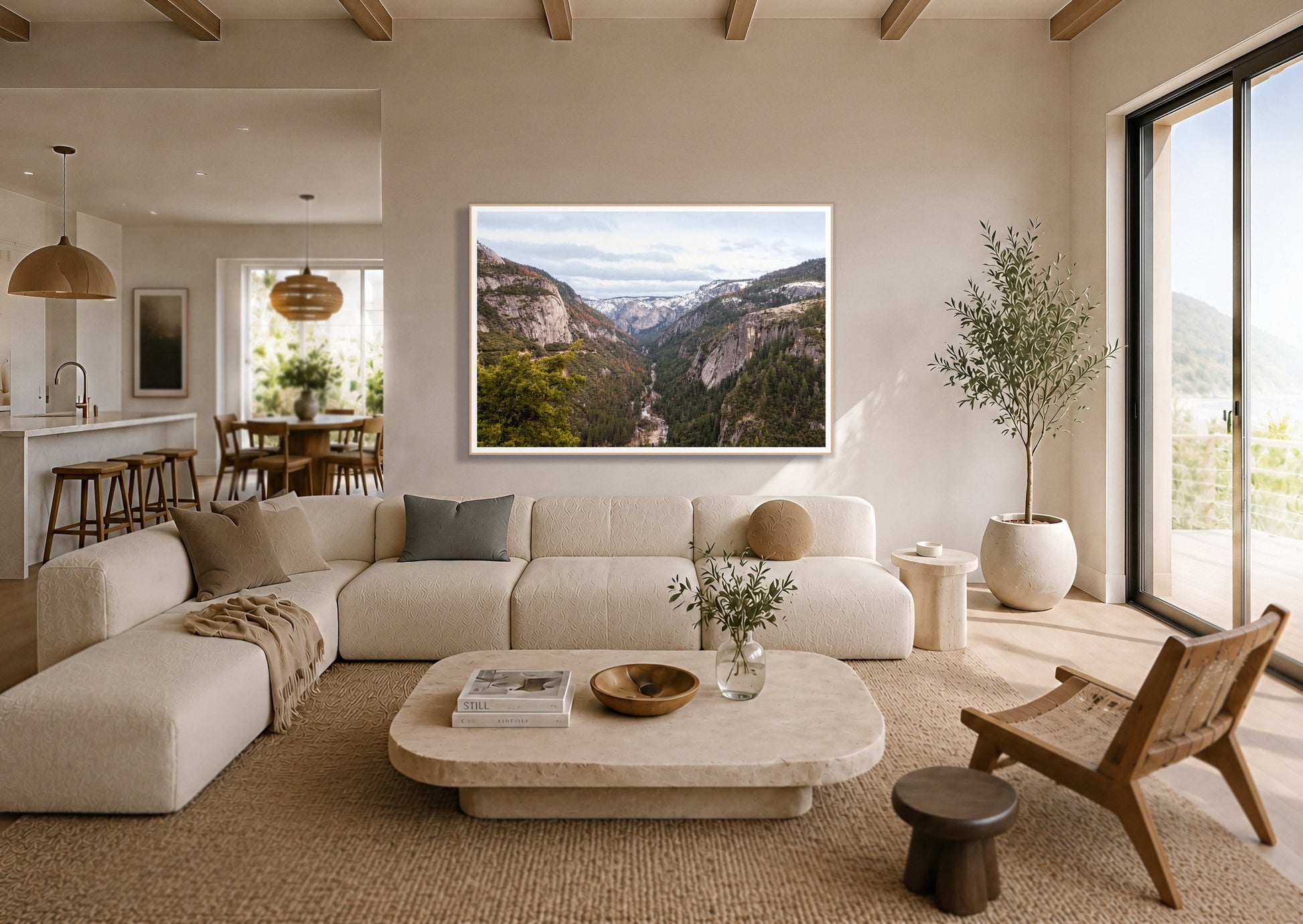 Yosemite Valley by Dylan Ozanich in an Oak frame, above a cream sectional in a coastal living room with an ocean view